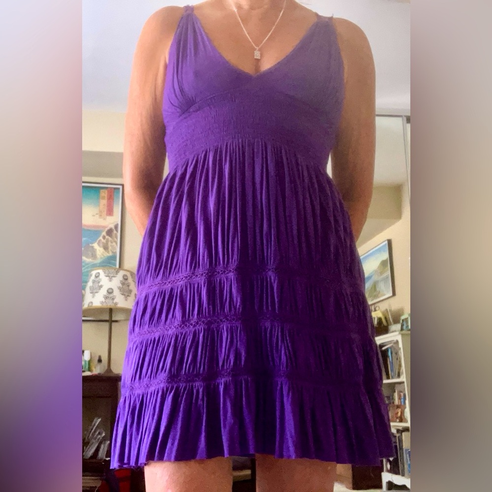 Free People mini Purple Dress with a flower appliqué on the back